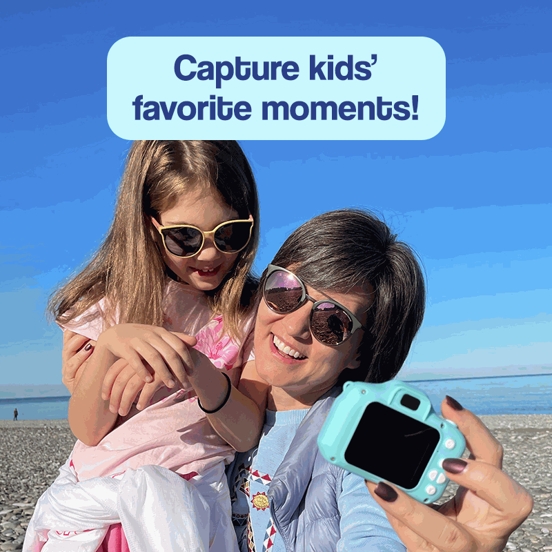 LittleLens Kids Camera held by adult with child on beach capturing moments