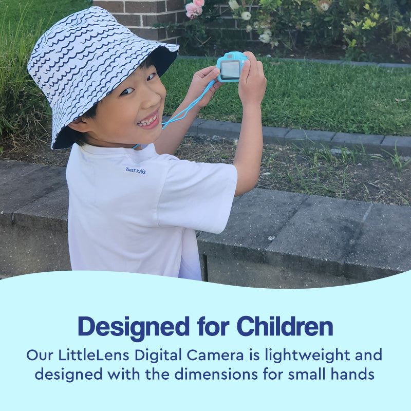 Child holding a lightweight LittleLens Kids Camera designed for small hands outdoors