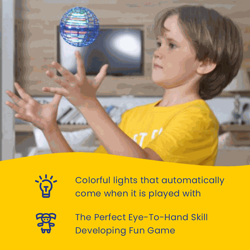 Child playing indoors with Galaxy Lights Flying Magic Orb showing colorful LED lights and hand-eye coordination fun