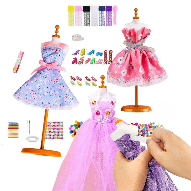Children's fashion design studio kit with mannequins, fabric, ribbons, and accessories for creative dressmaking.
