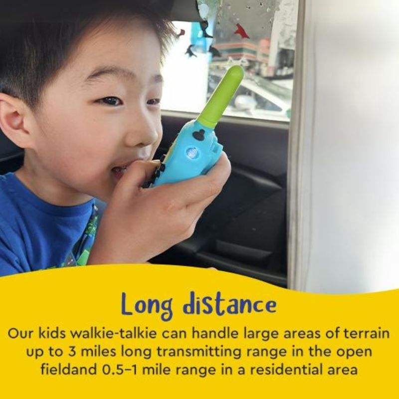 Child using blue kids walkie talkie with green antenna showing long distance communication feature